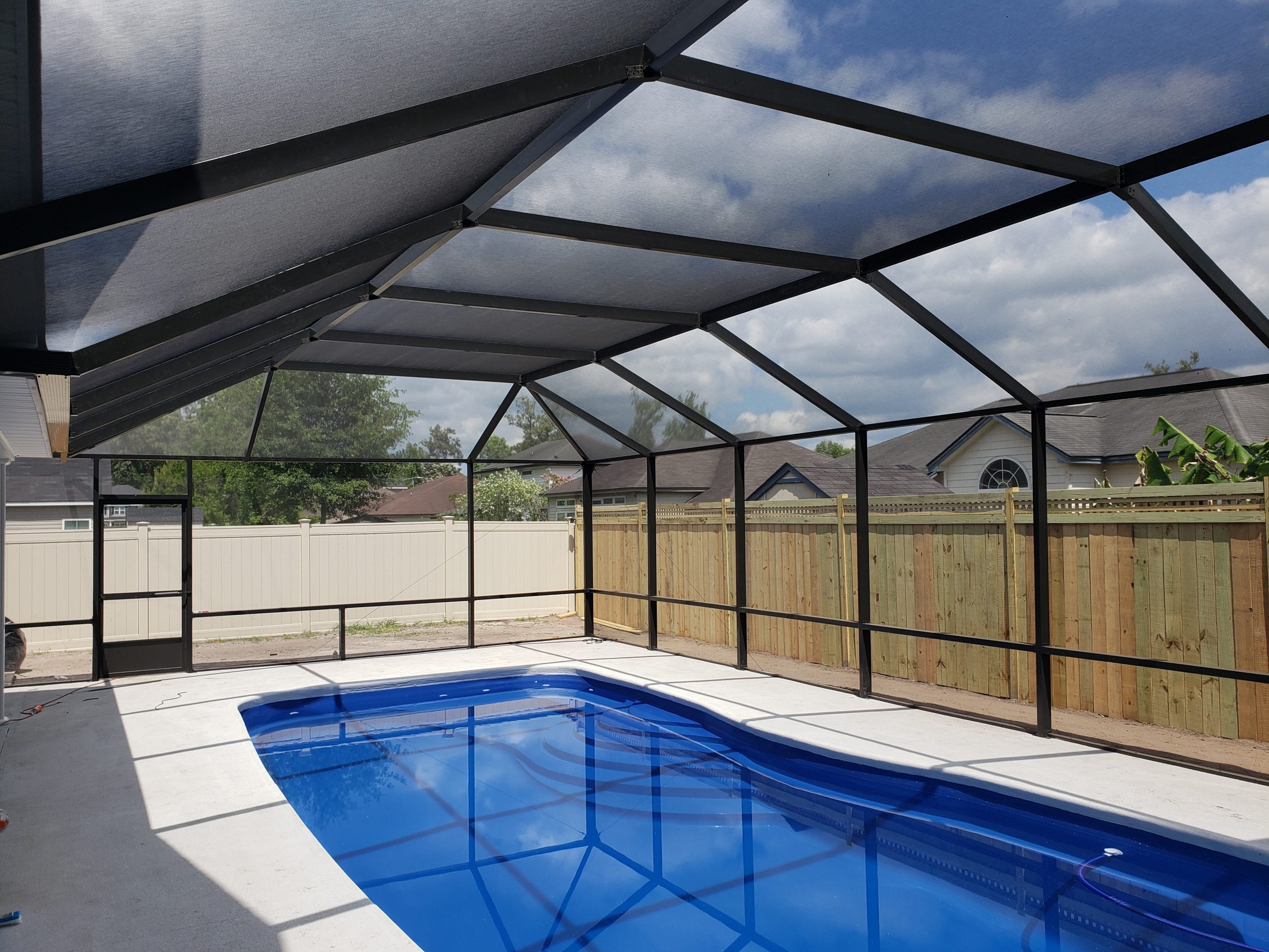 How Pool Enclosures Cut Maintenance Costs in Spartanburg, SC